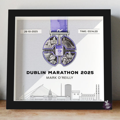 Framed Dublin Marathon 2025 medal display with a black frame and grey background