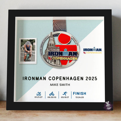Ironman Copenhagen medal display frame in black frame with mint background